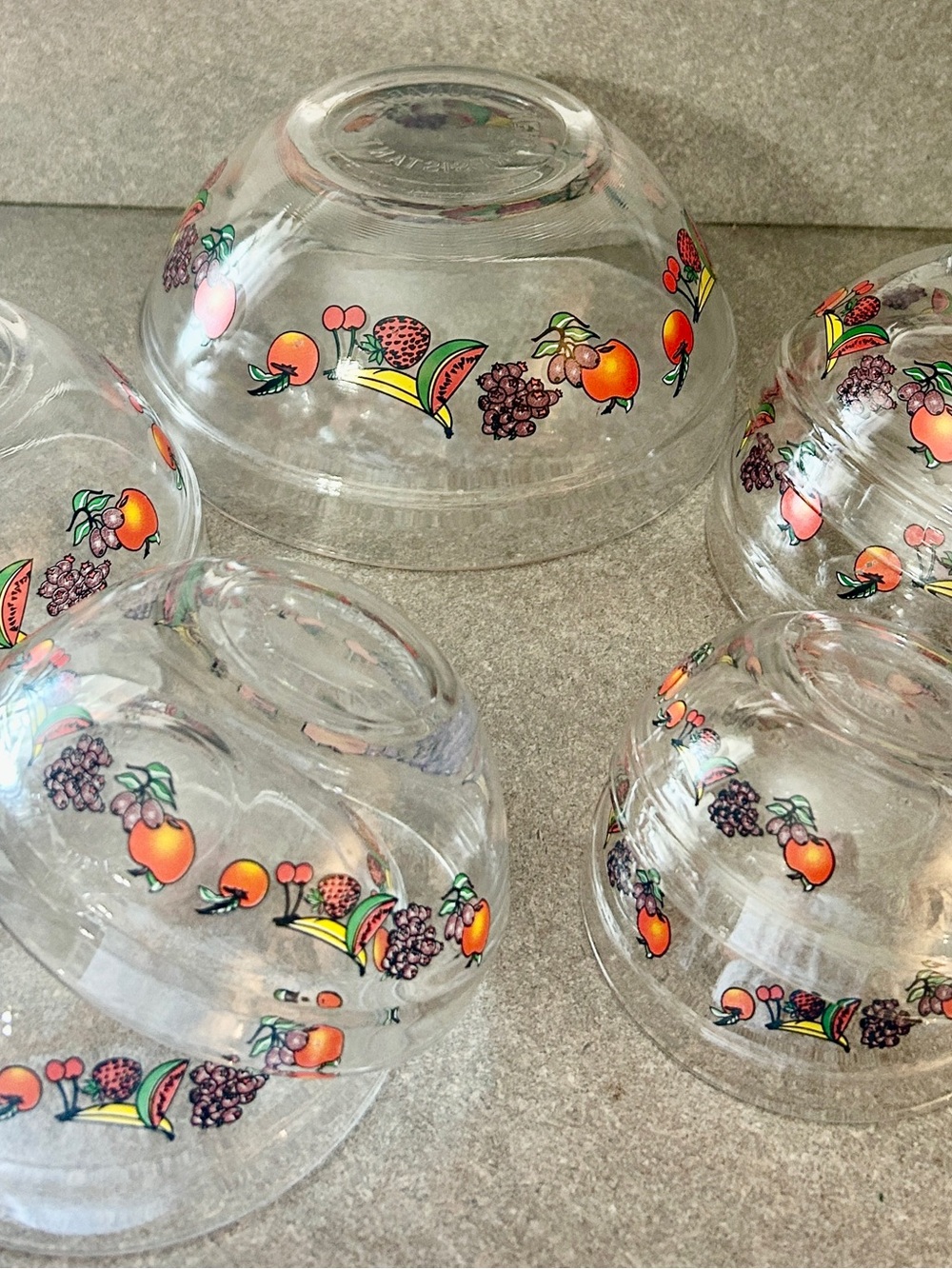 Vintage glass nesting bowls with fruit border